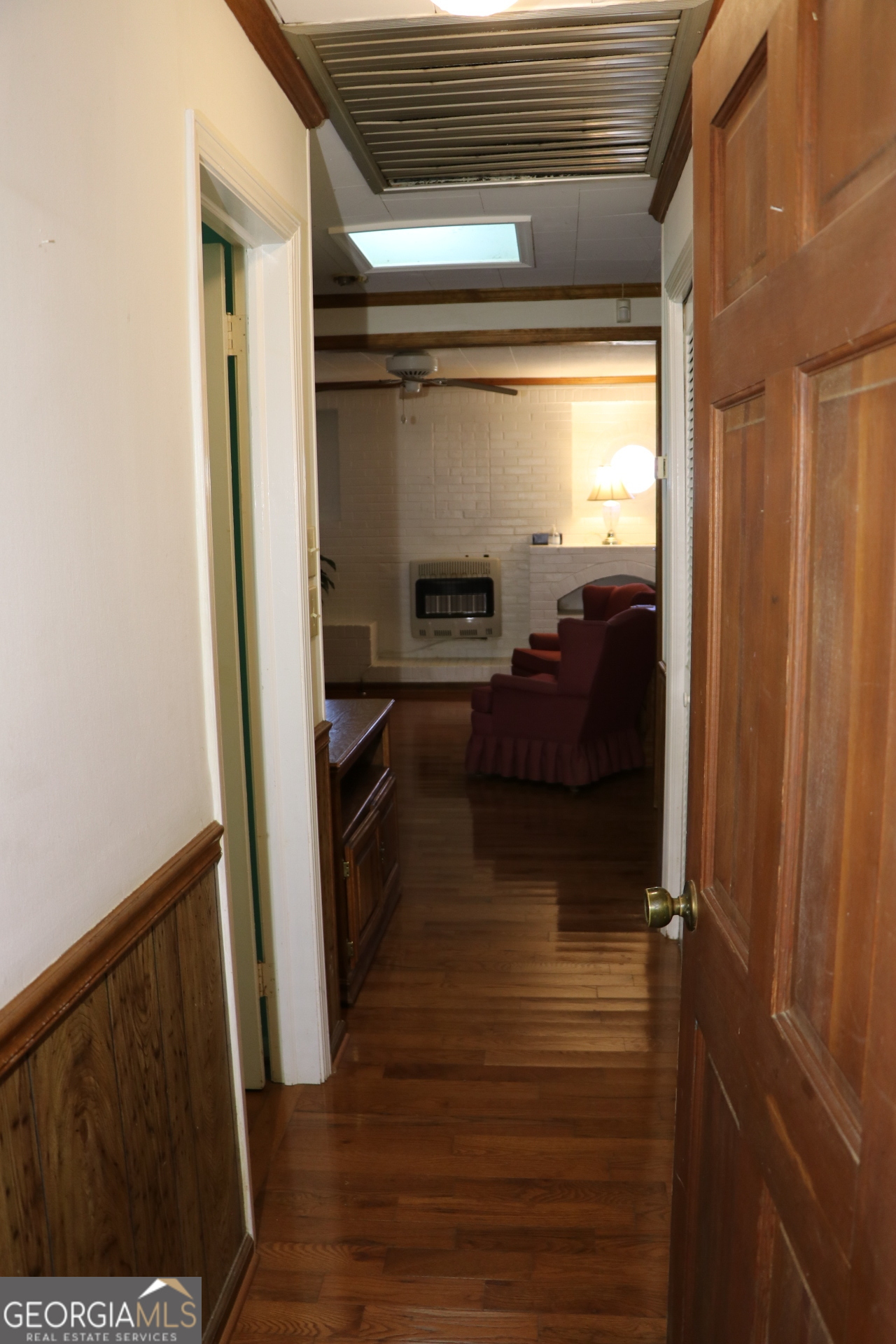 6797 Highway 114 Lyerly, GA 30730 - Photo 26 of 56 a view of a hallway view with wooden floor and staircase