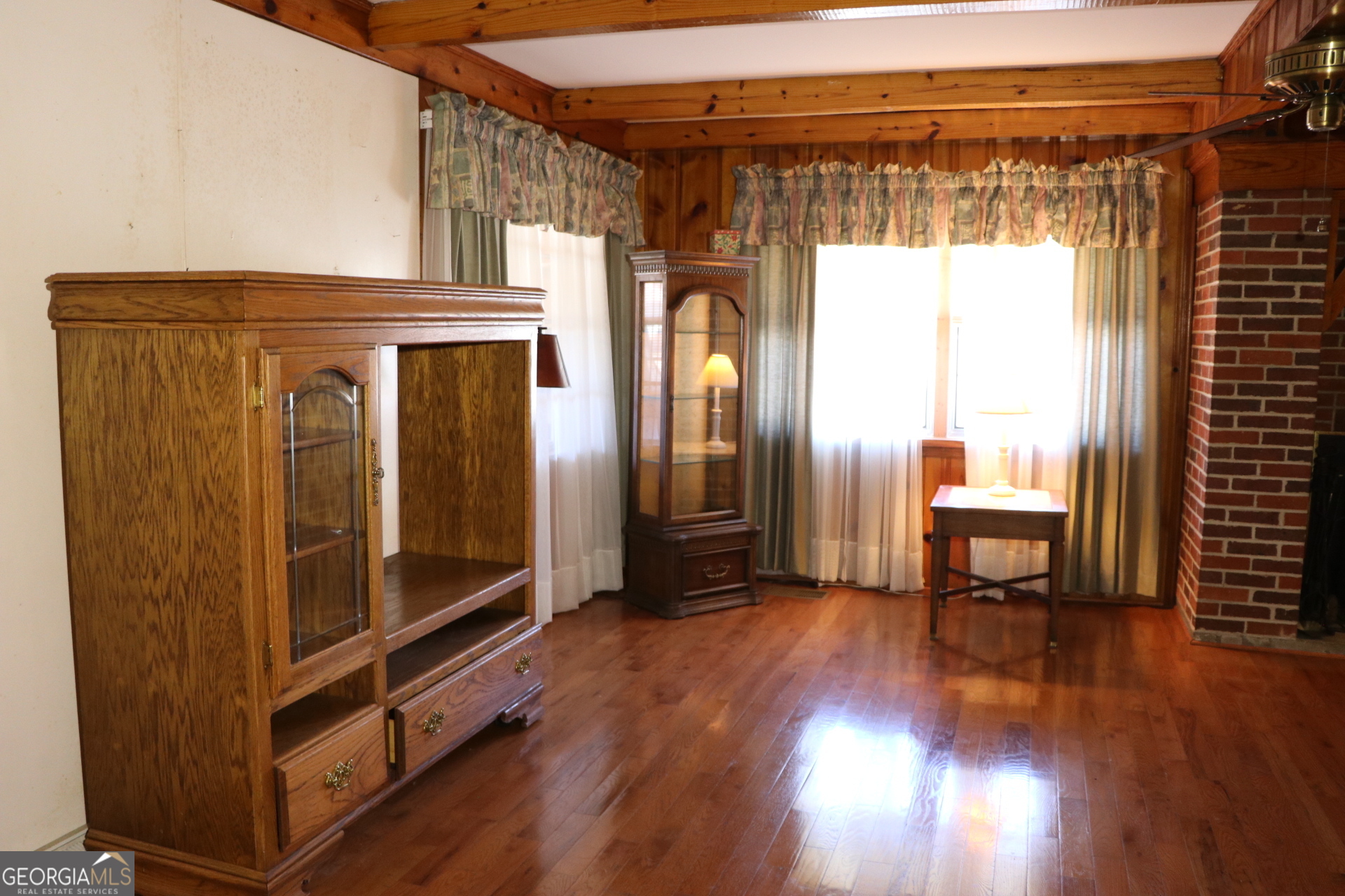 6797 Highway 114 Lyerly, GA 30730 - Photo 31 of 56 a view of a room with wooden floor and chair