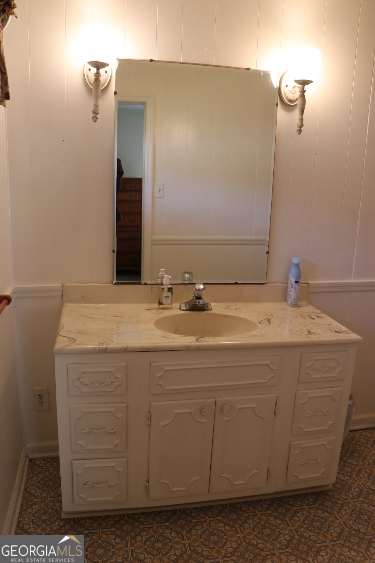 6797 Highway 114 Lyerly, GA 30730 - Photo 41 of 56 a bathroom with a sink and a mirror