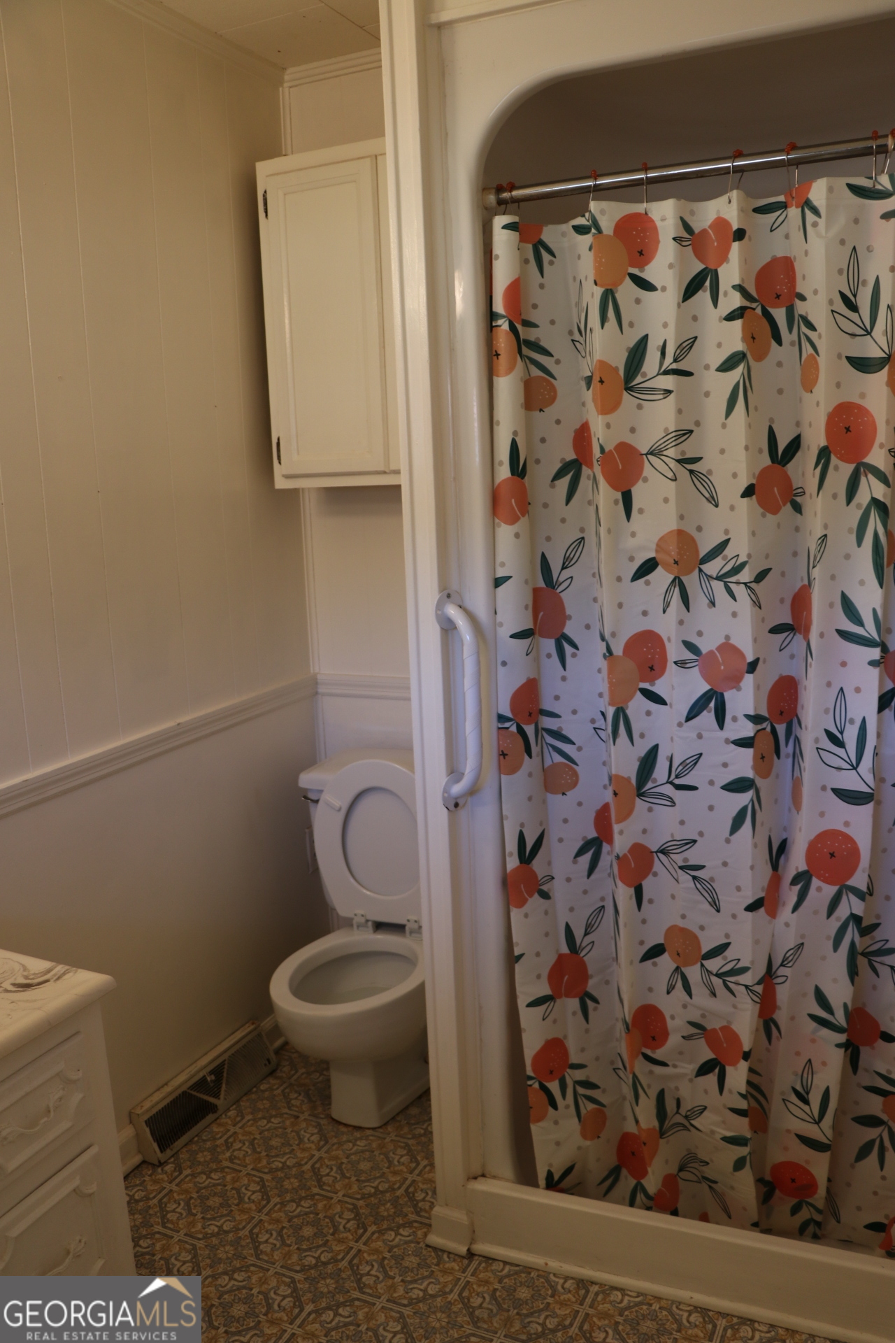 6797 Highway 114 Lyerly, GA 30730 - Photo 42 of 56 a white toilet sitting next to a shower curtain