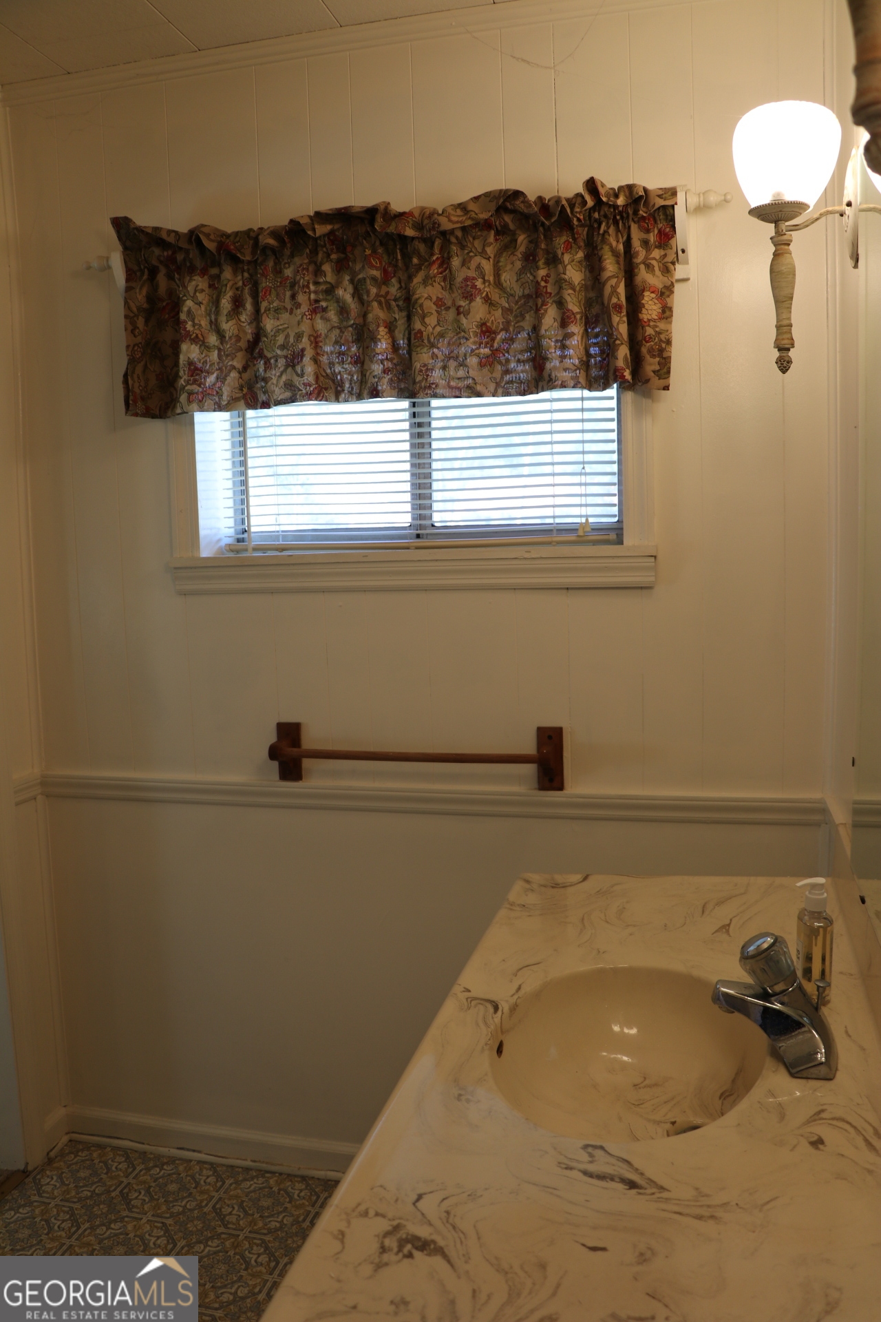 6797 Highway 114 Lyerly, GA 30730 - Photo 43 of 56 a bathroom with a sink and a window