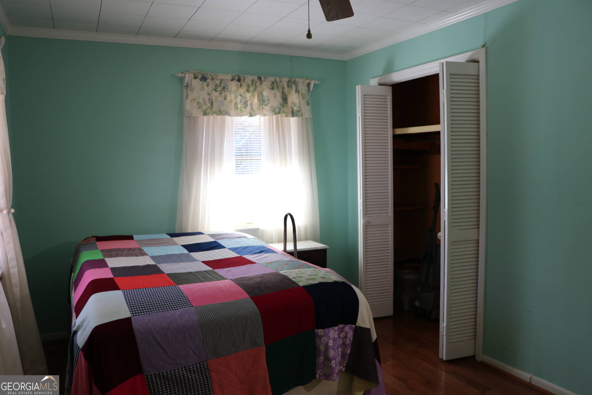 6797 Highway 114 Lyerly, GA 30730 - Photo 47 of 56 a bedroom with a bed and a window