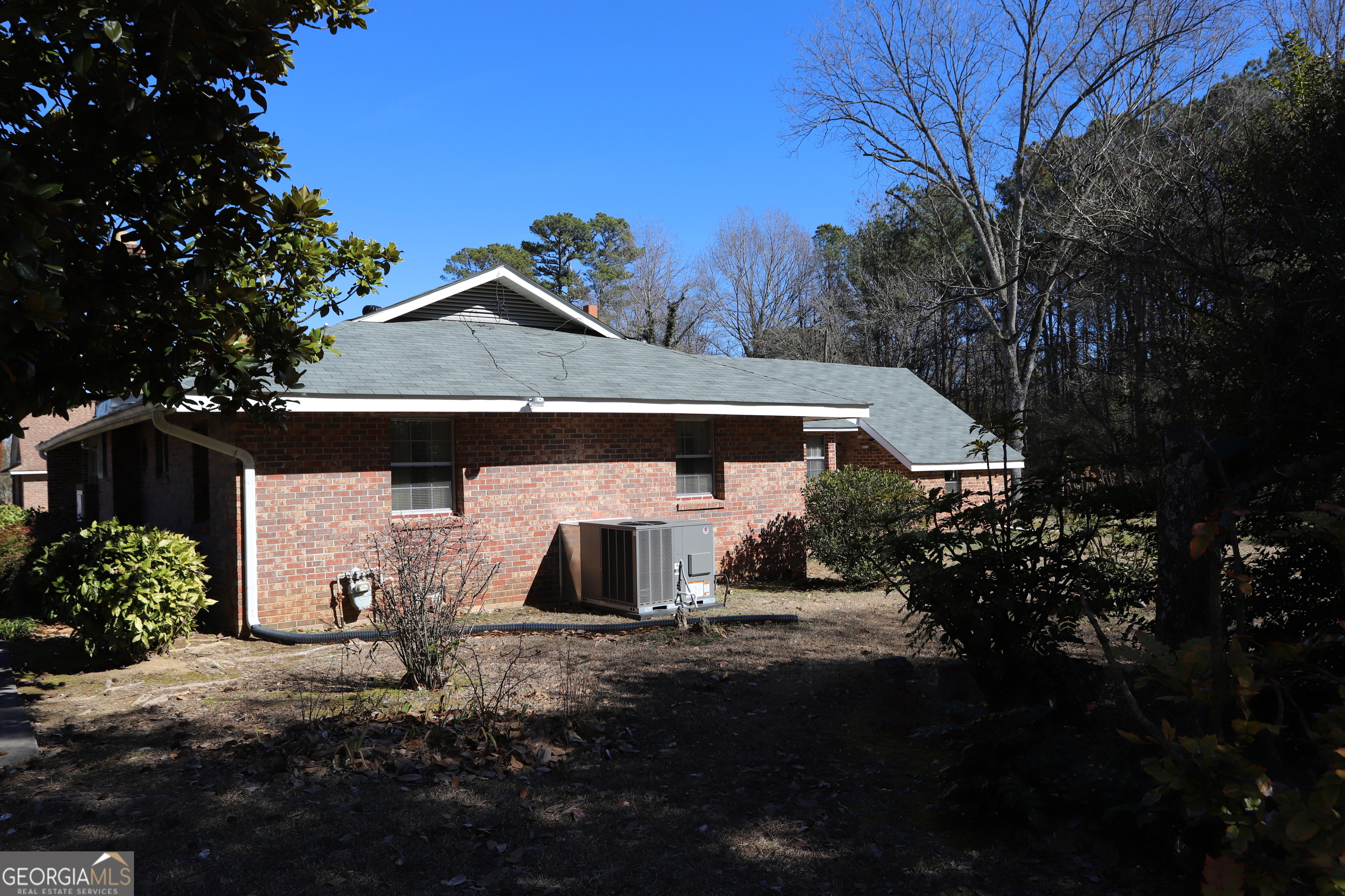6797 Highway 114 Lyerly, GA 30730 - Photo 5 of 56 a front view of a house with a yard