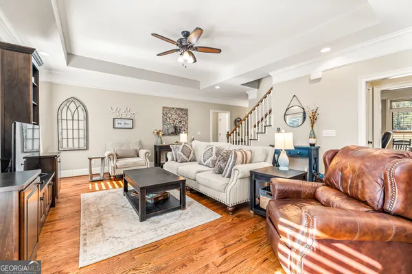 a kitchen with stainless steel appliances granite countertop a sink and stove top oven