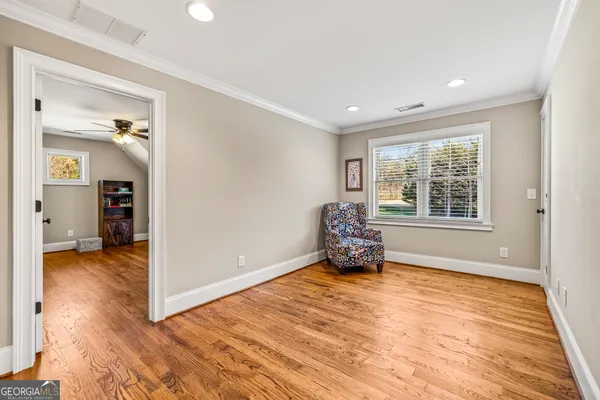 a bed room with a bed and a window