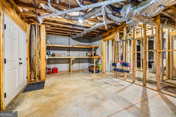 a view of a house with brick walls
