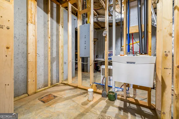 swimming pool view with a sitting space