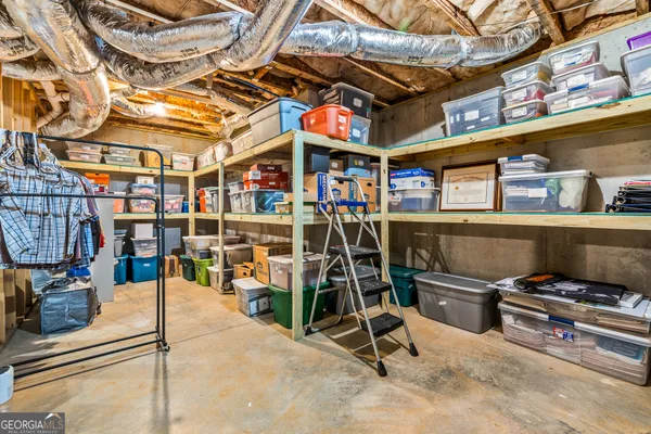 an aerial view of a house with outdoor space