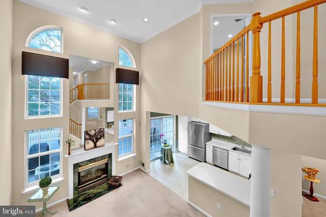 a view of livingroom with furniture and workspace