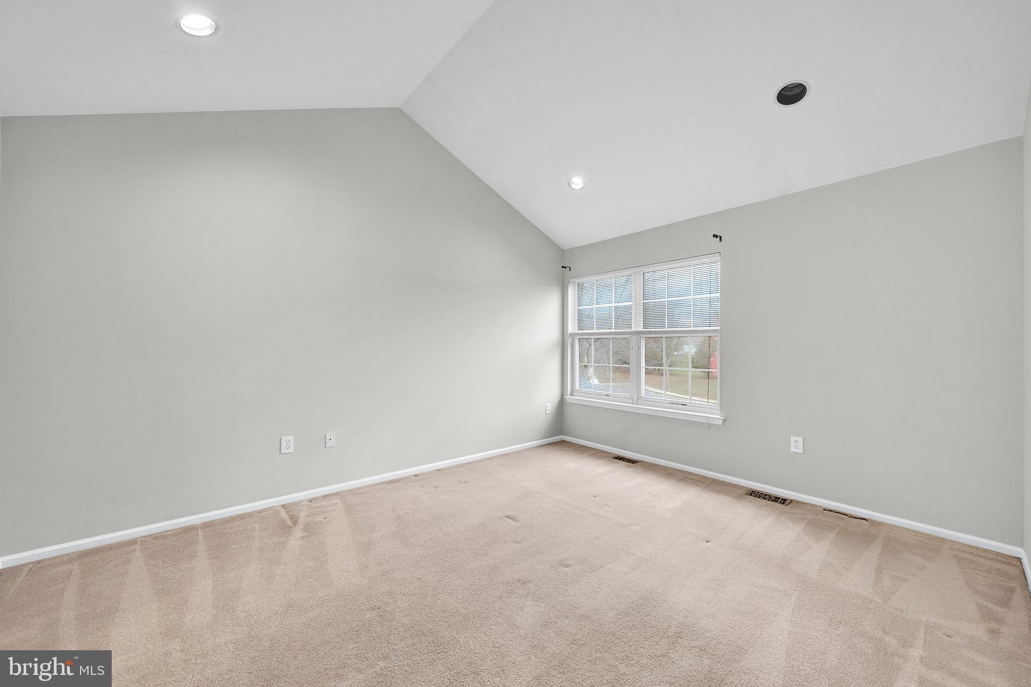 305 Deer Run Court Pennington, NJ 08534 - Photo 20 of 34 a view of an empty room with a window
