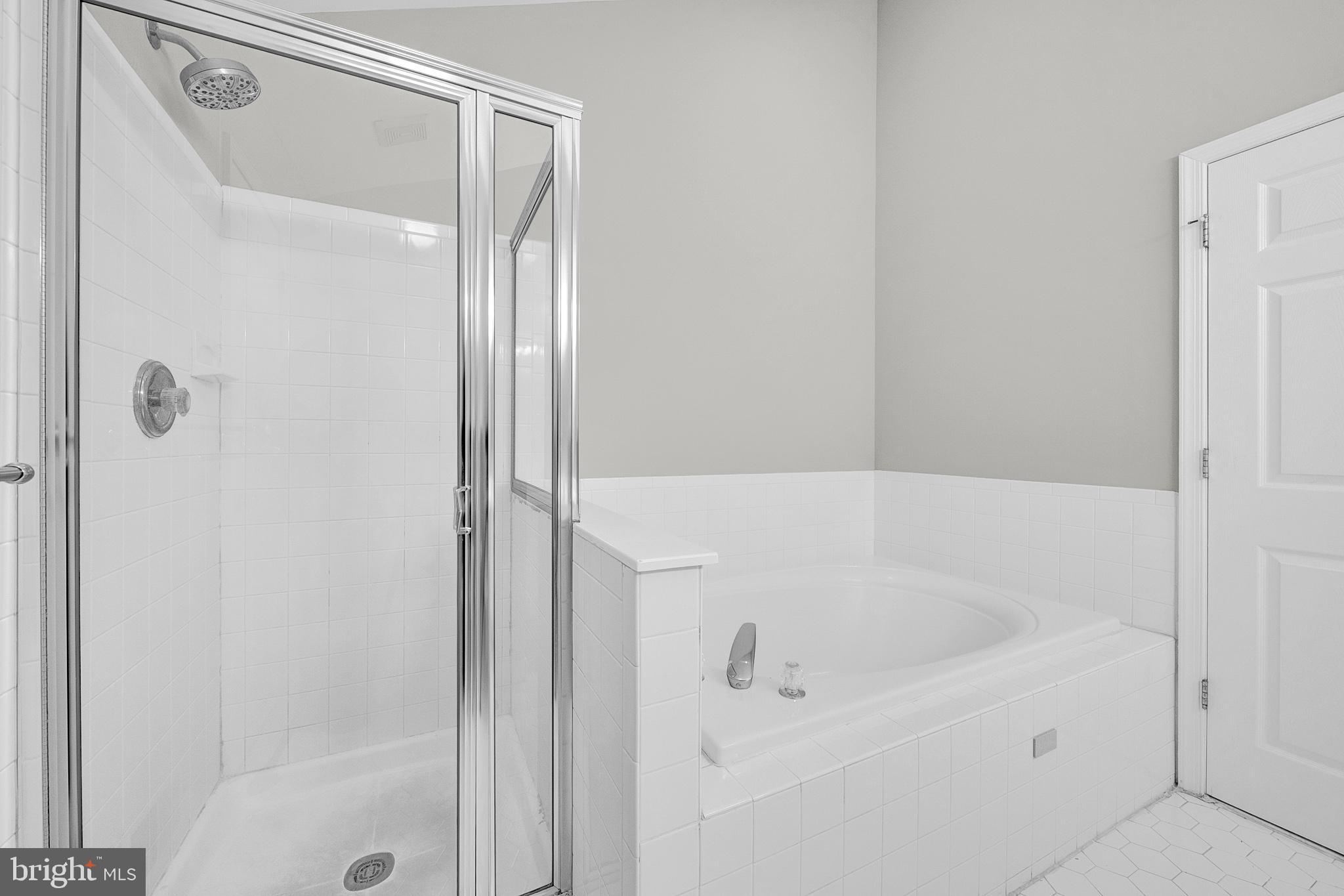 305 Deer Run Court Pennington, NJ 08534 - Photo 23 of 34 a white bath tub sitting next to a shower