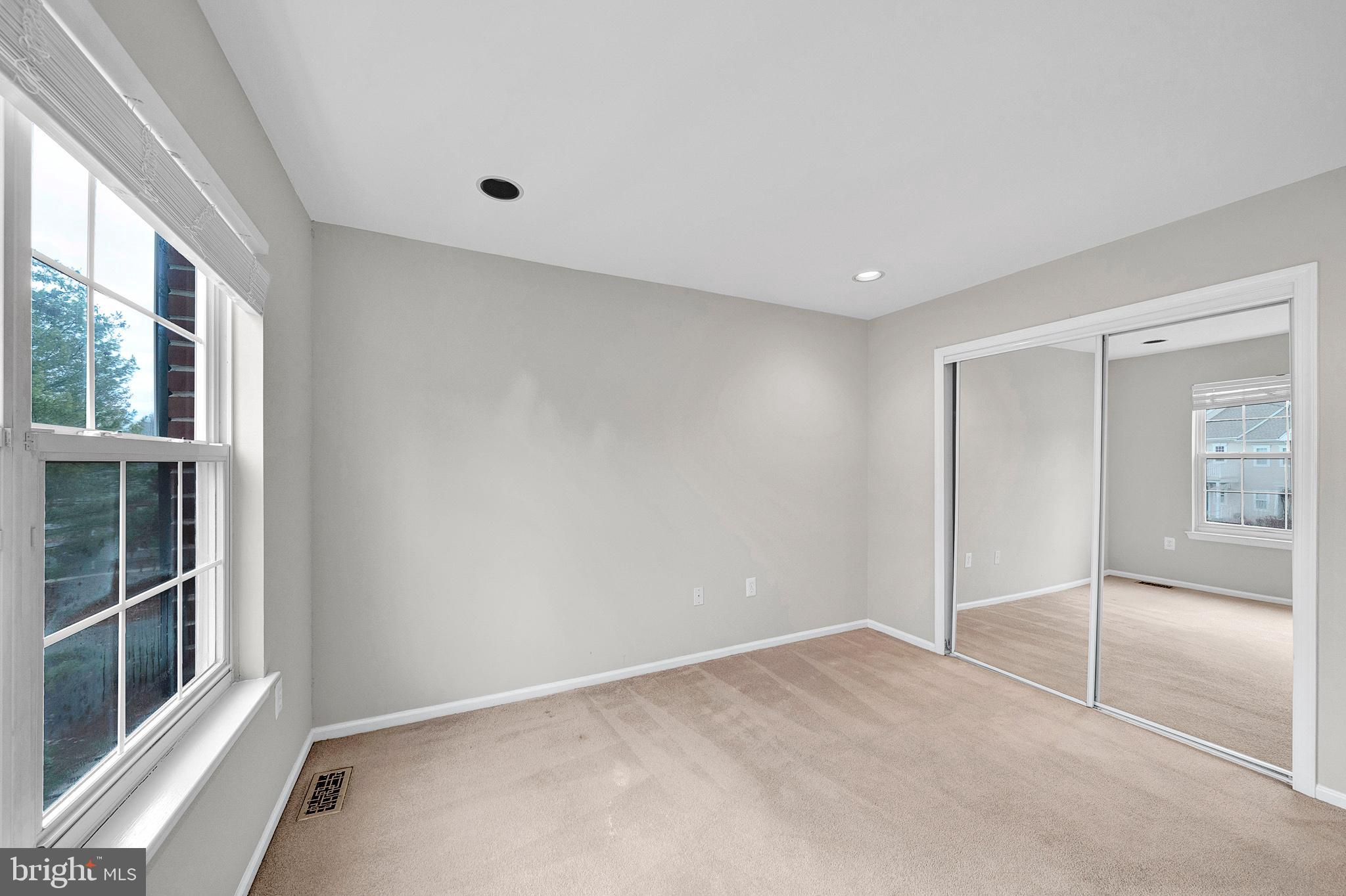 305 Deer Run Court Pennington, NJ 08534 - Photo 25 of 34 a view of an empty room with a window
