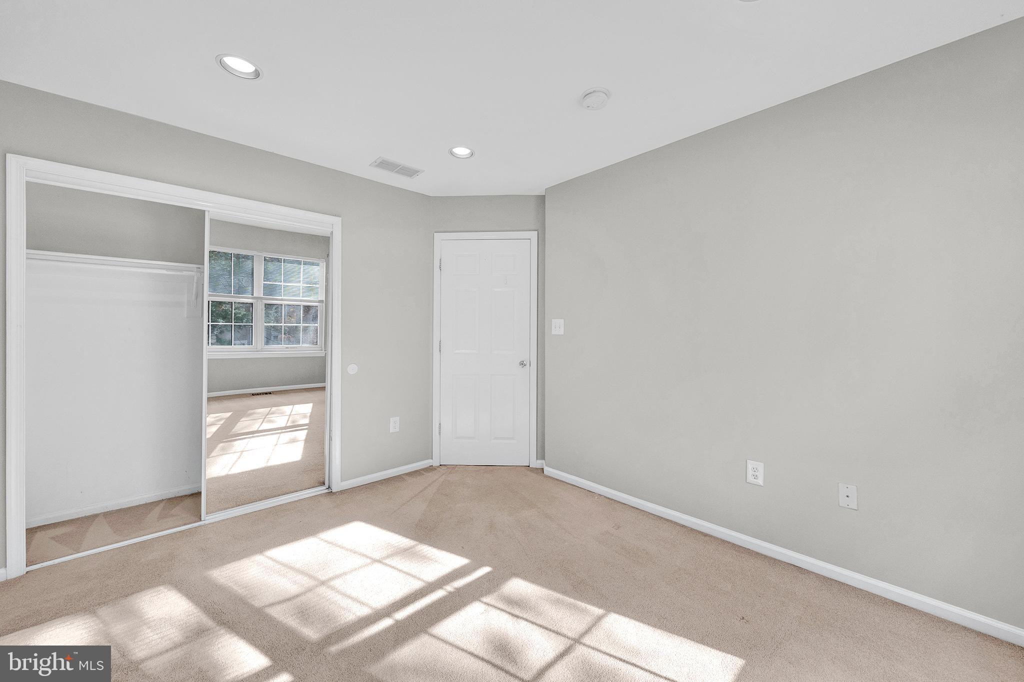 305 Deer Run Court Pennington, NJ 08534 - Photo 27 of 34 a view of an empty room and window