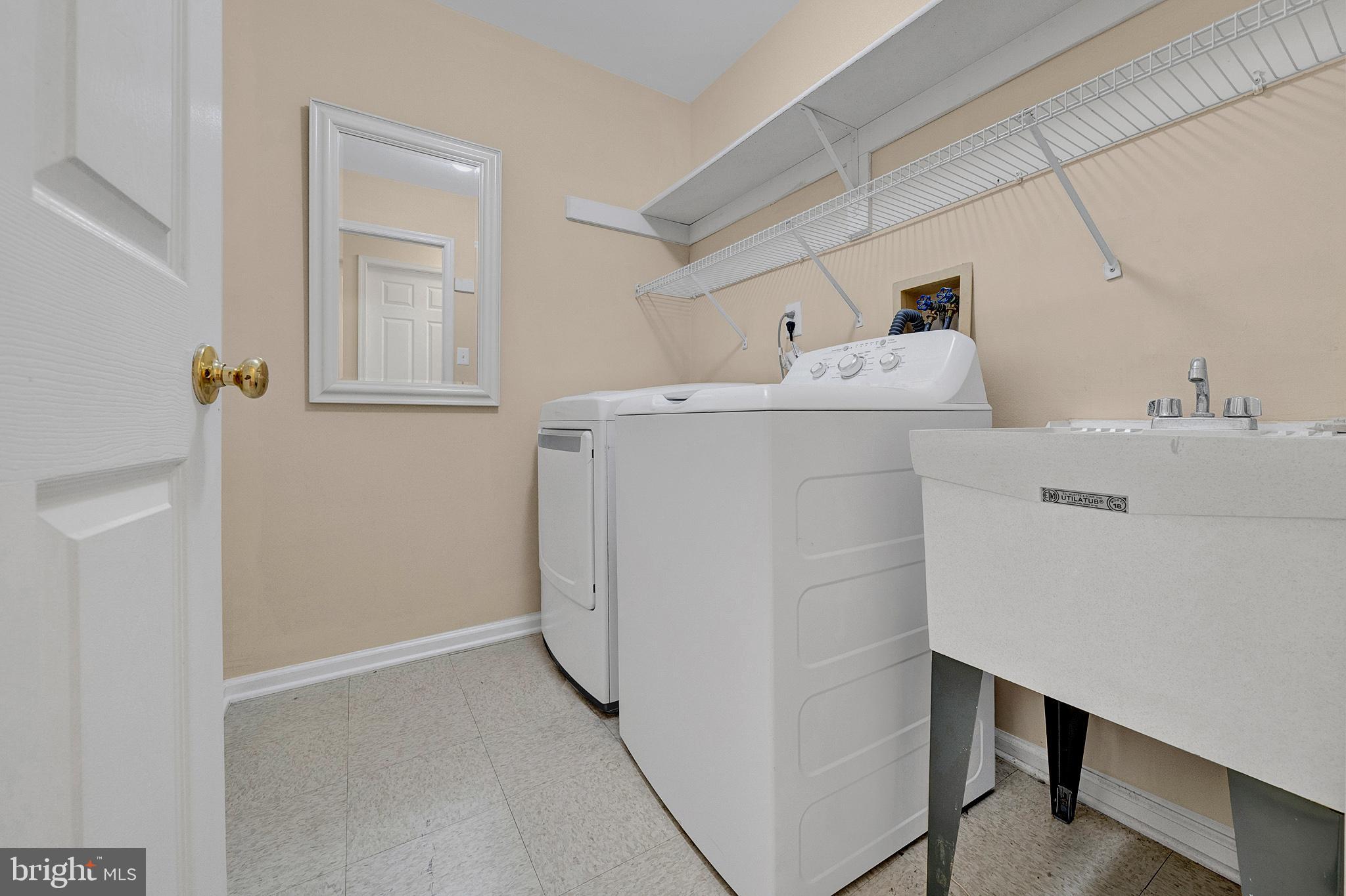 305 Deer Run Court Pennington, NJ 08534 - Photo 29 of 34 a utility room with dryer and washer
