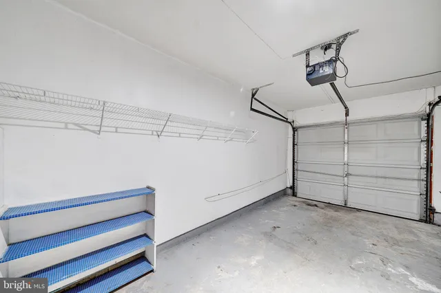 a view of a garage with storage