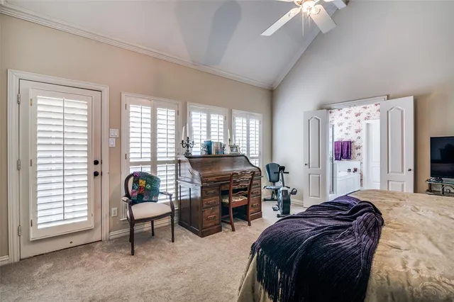 a bedroom with bed and a window