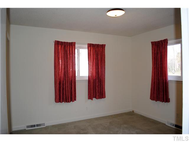 2540 Fairlawn Road Durham, NC 27705 - Photo 8 of 13 Master Bedroom with half bath