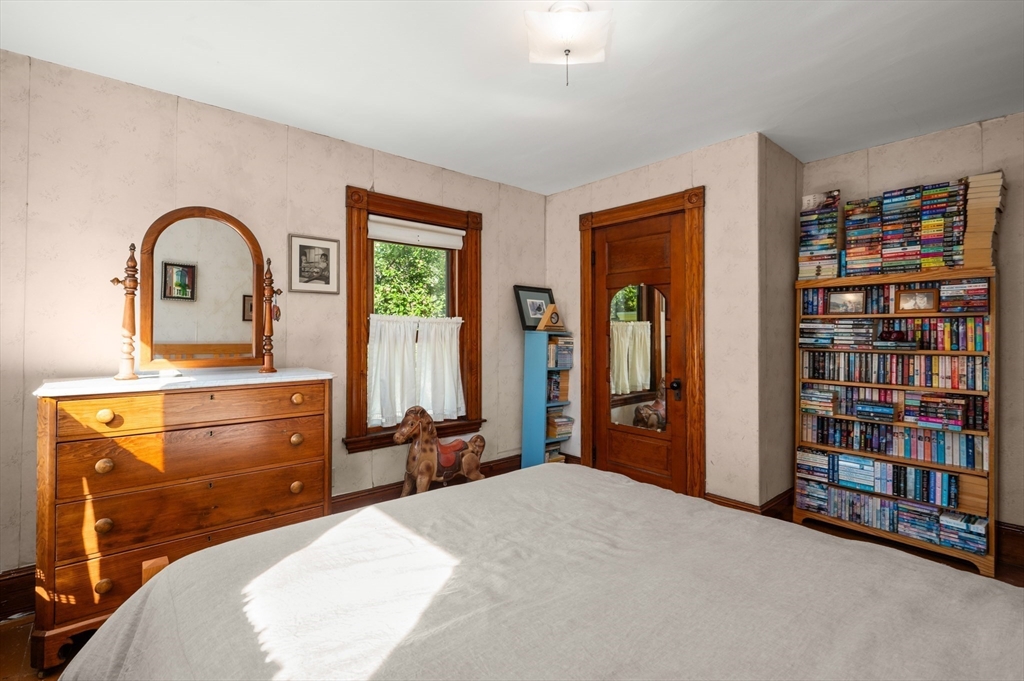 14 Summer Street Andover, MA 01810 - Photo 18 of 31 a bed room with a bed and a television