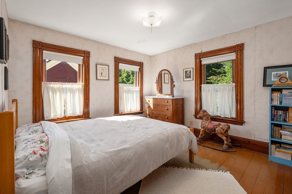 14 Summer Street Andover, MA 01810 - Photo 25 of 31 a bedroom with a bed furniture and a window