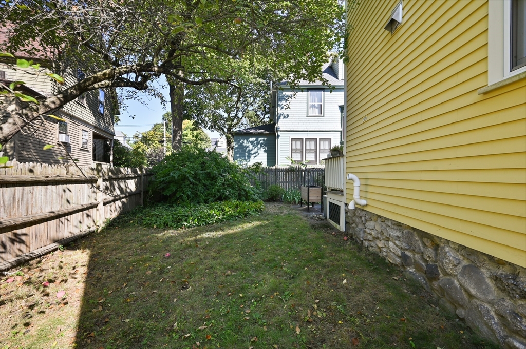 14 Summer Street Andover, MA 01810 - Photo 29 of 31 a pathway of a house with a yard