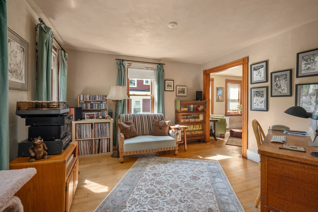 14 Summer Street Andover, MA 01810 - Photo 5 of 31 a living room with furniture and a fireplace