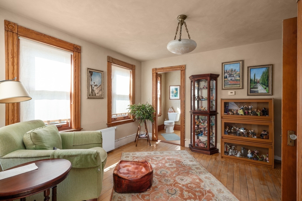 14 Summer Street Andover, MA 01810 - Photo 8 of 31 a living room with furniture and a window
