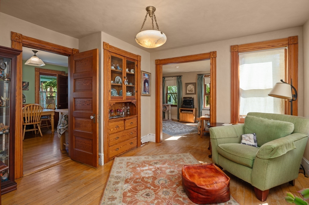 14 Summer Street Andover, MA 01810 - Photo 9 of 31 a living room with furniture and a window
