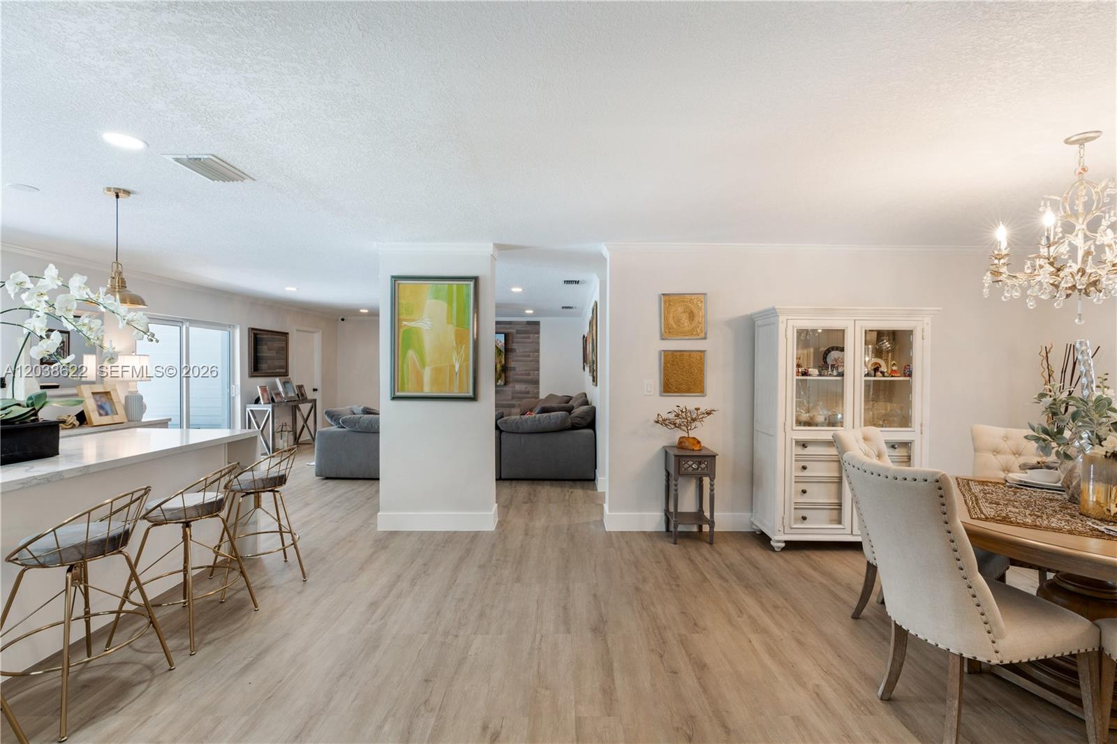 14830 Southwest 149th Street Miami, FL 33196 - Photo 6 of 43 a living room with furniture and wooden floor