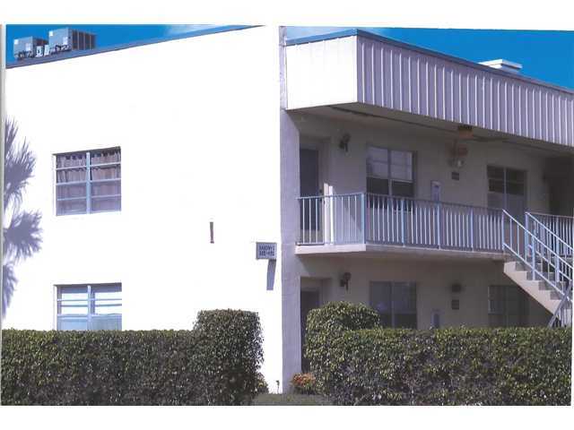 409 Saxony Way, Unit 409 Delray Beach, FL 33446 - Photo 1 of 8 a view of a house with a balcony