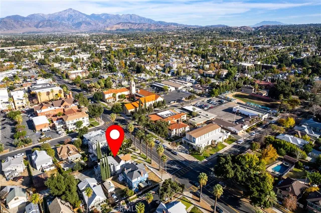 an aerial view of residential houses and city street