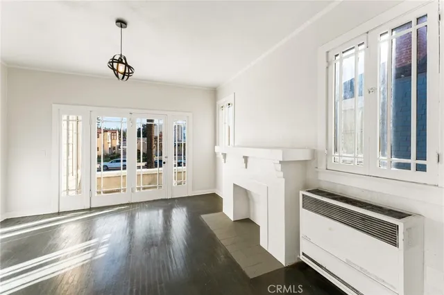 a kitchen with a refrigerator and window