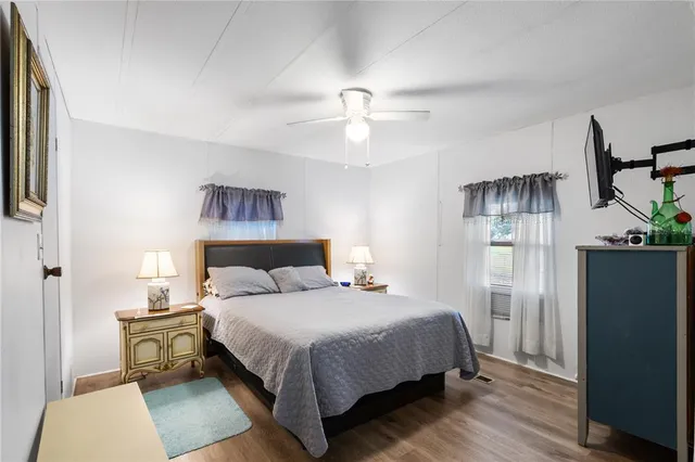 a bathroom with a sink toilet and a mirror