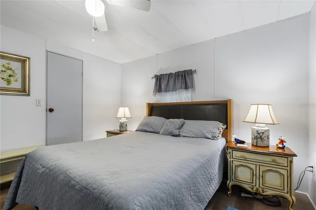 a bathroom with a sink toilet vanity and shower