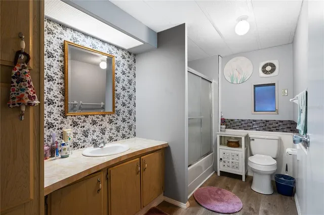 a view of hallway with washer and dryer
