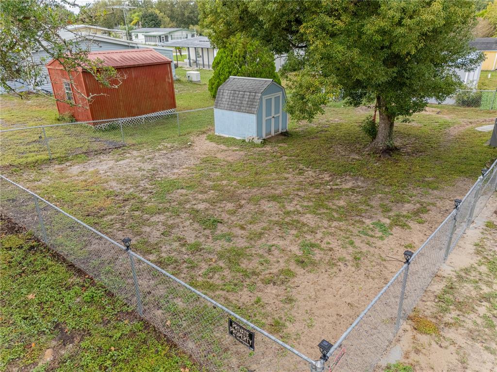 26 Da-Rosa Avenue DeBary, FL 32713 - Photo 32 of 45 a view of a backyard