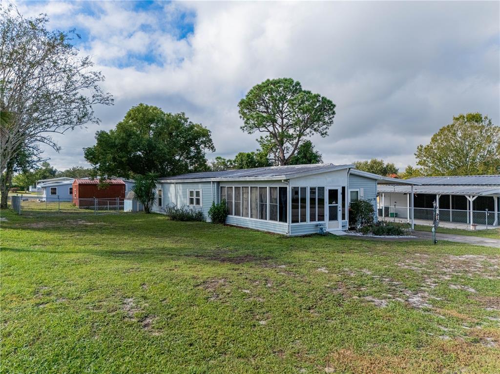 26 Da-Rosa Avenue DeBary, FL 32713 - Photo 4 of 45 a view of a house with a yard