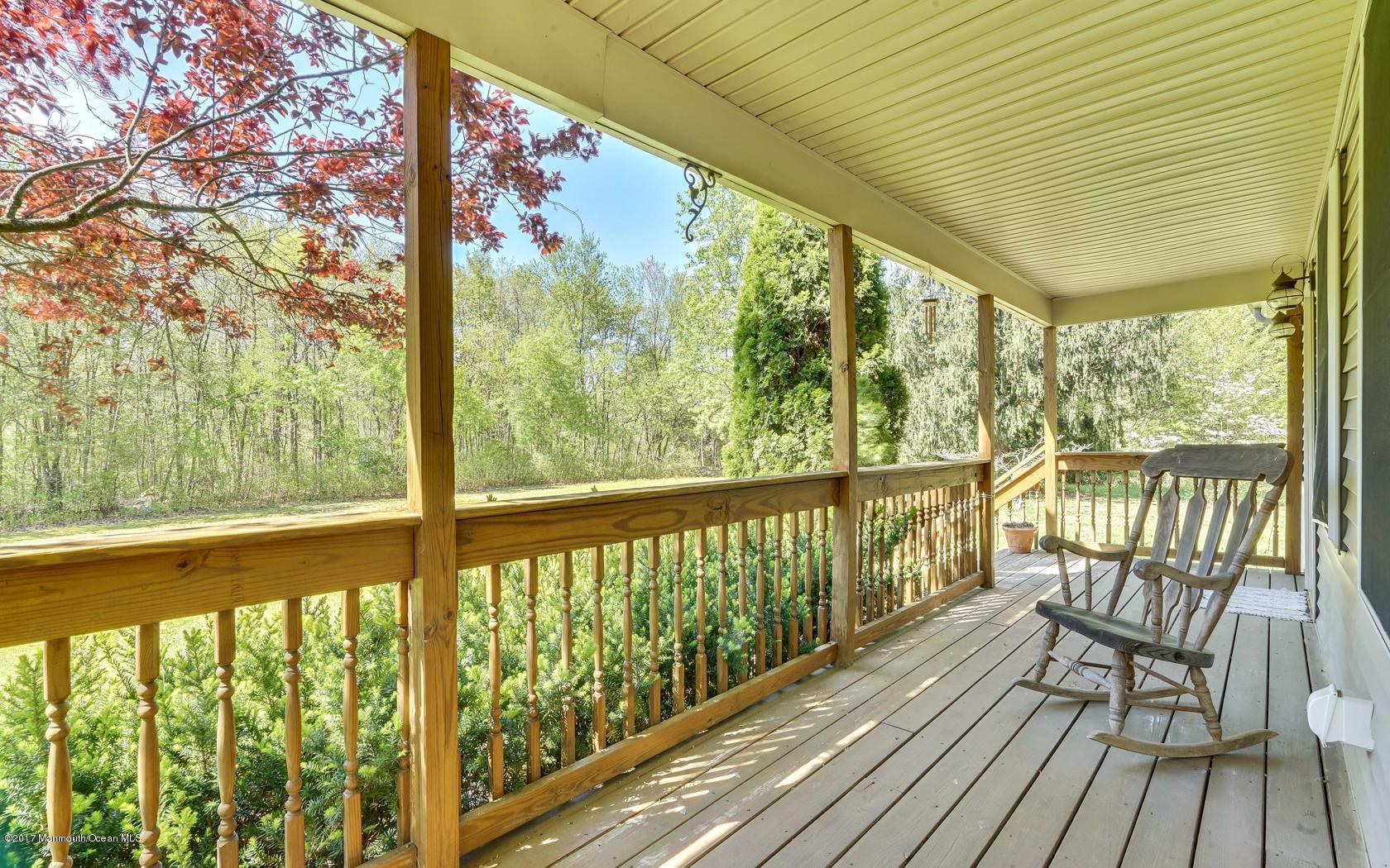 460 North County Line Road Jackson, NJ 08527 - Photo 12 of 48 a view of two chairs in a balcony