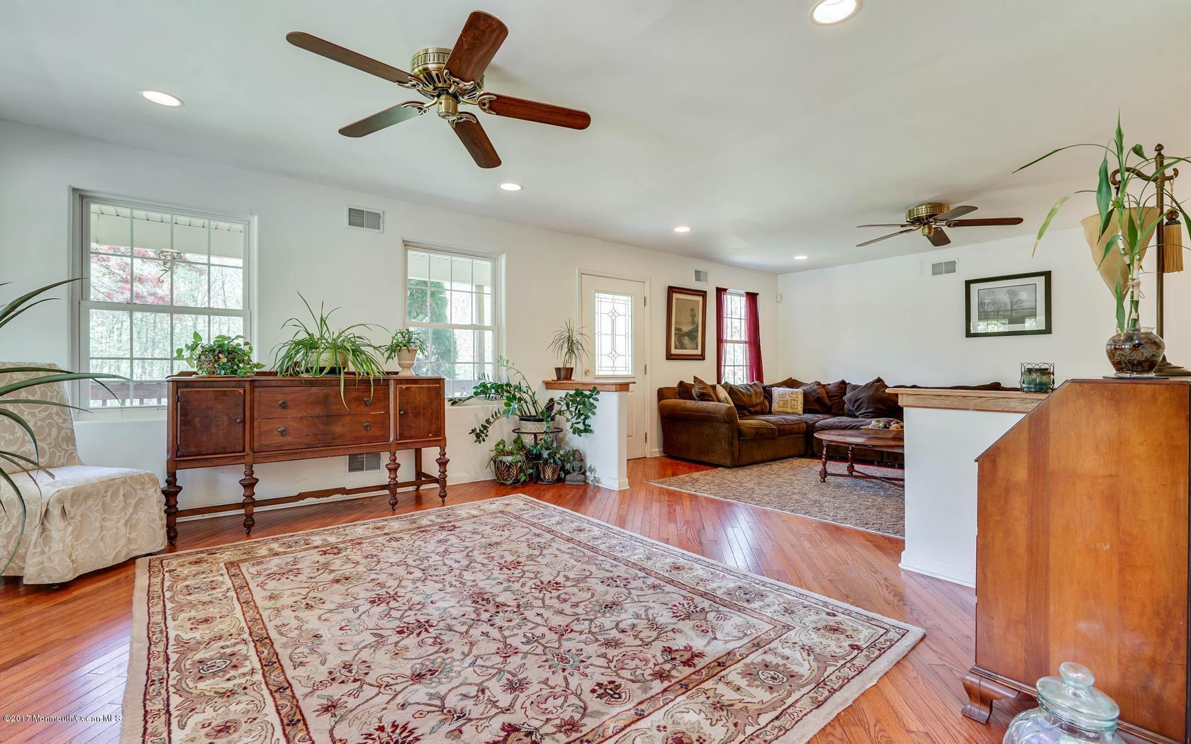 460 North County Line Road Jackson, NJ 08527 - Photo 15 of 48 a living room with furniture rug and a table