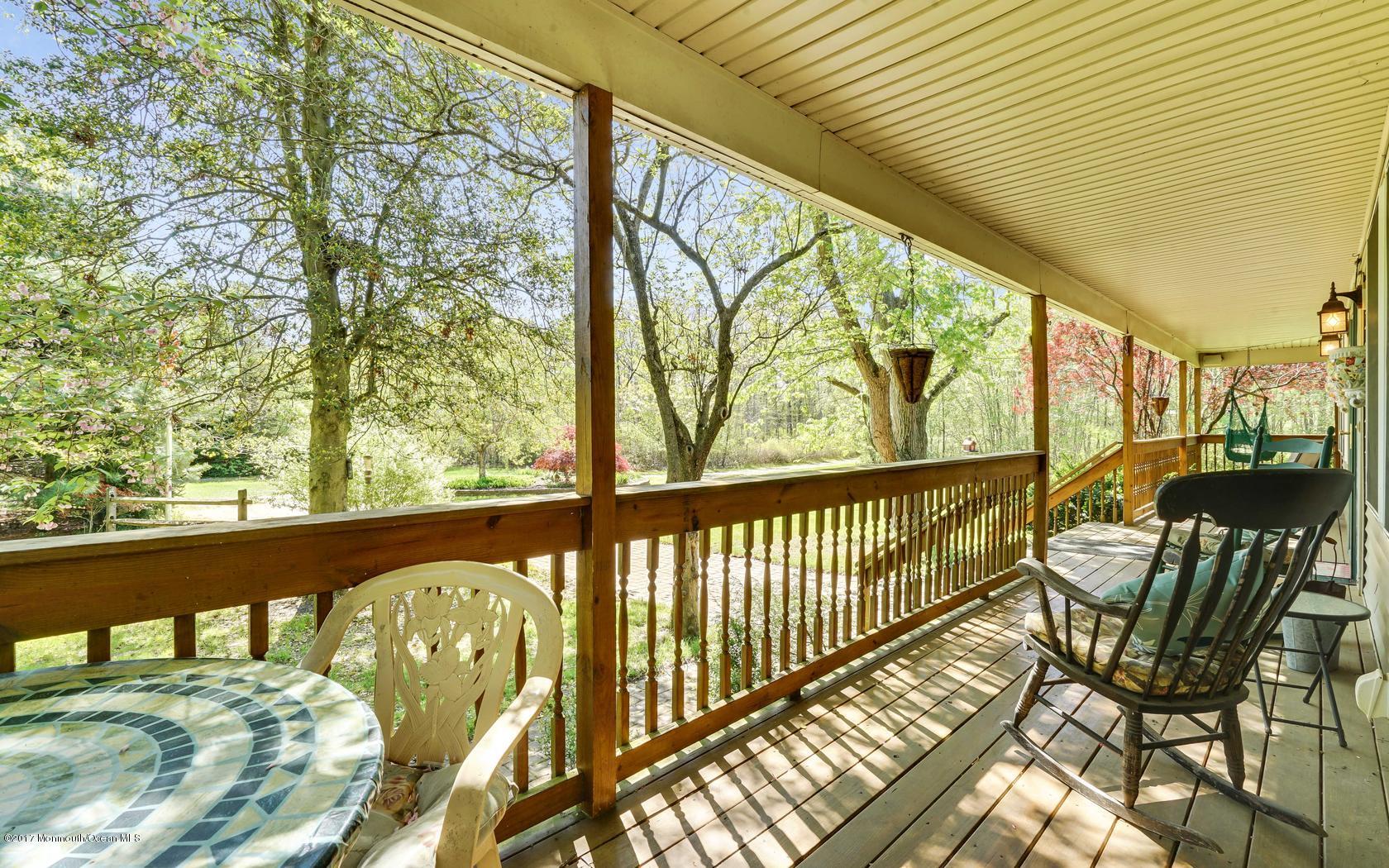 460 North County Line Road Jackson, NJ 08527 - Photo 2 of 48 a view of a chairs and table in the balcony