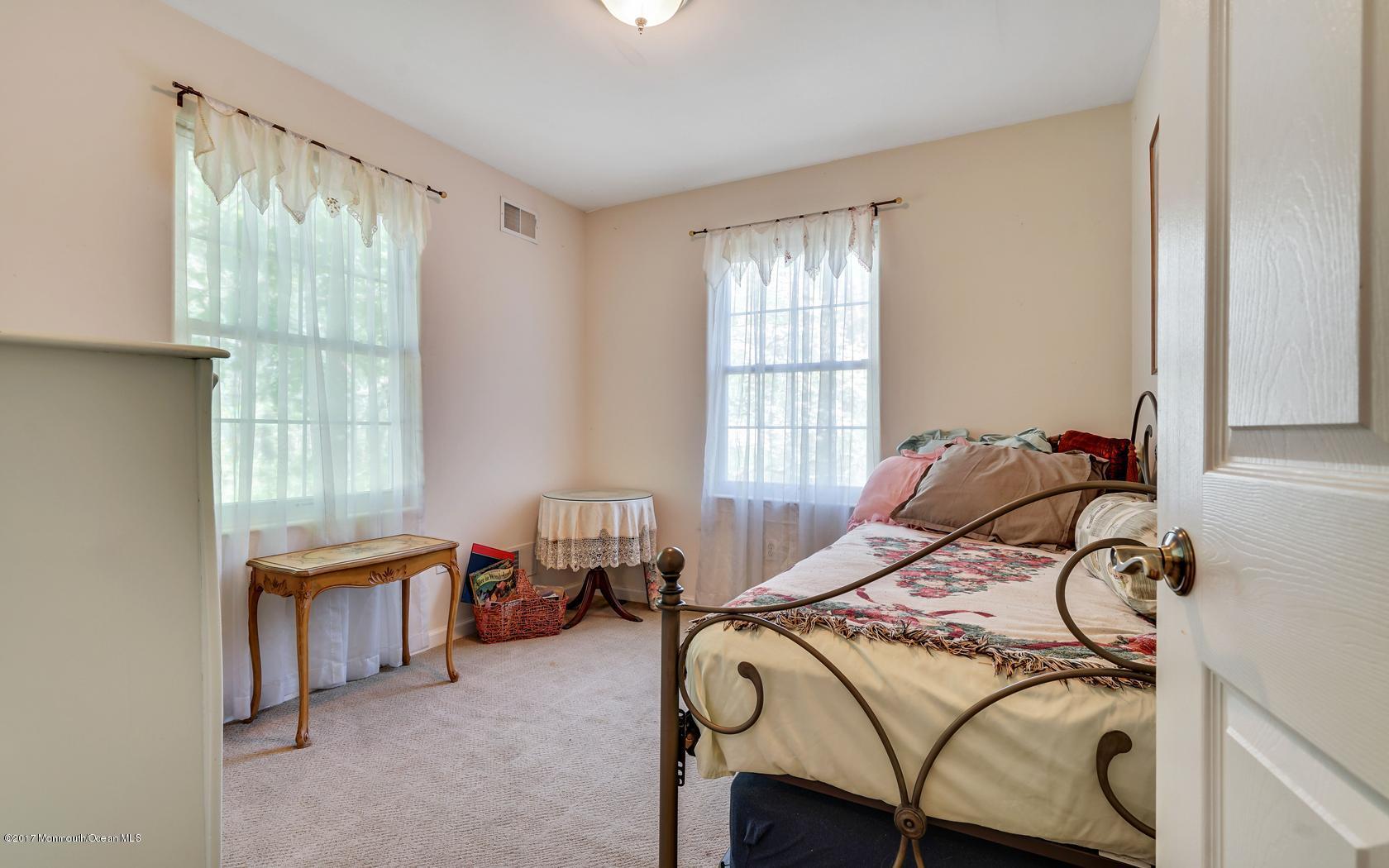 460 North County Line Road Jackson, NJ 08527 - Photo 25 of 48 a bedroom with a bed and a window