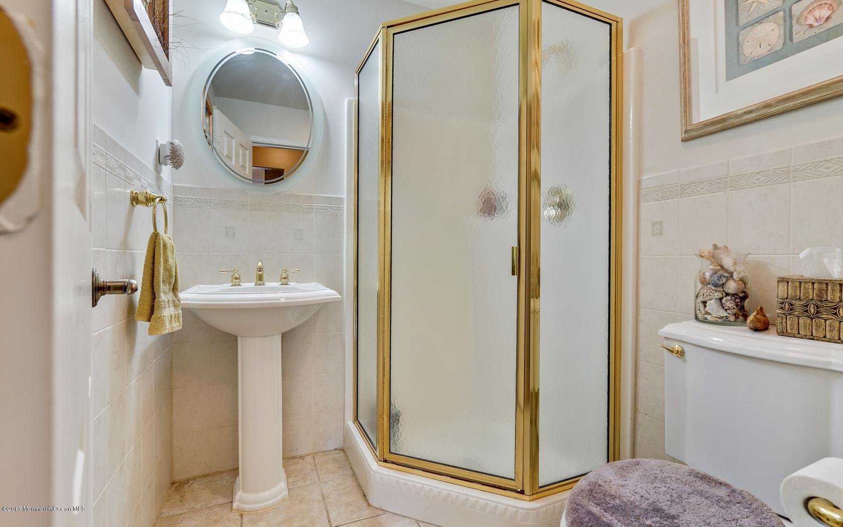 460 North County Line Road Jackson, NJ 08527 - Photo 26 of 48 a bathroom with a sink a toilet and shower