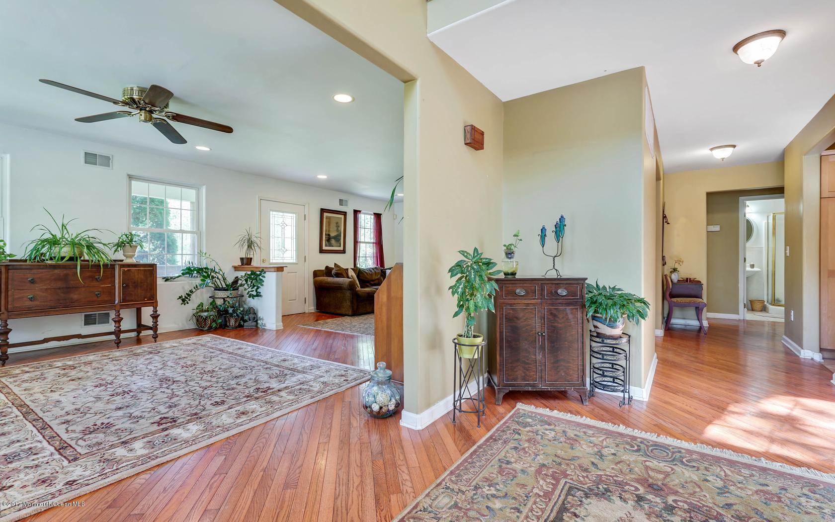 460 North County Line Road Jackson, NJ 08527 - Photo 3 of 48 a living room with furniture and wooden floor