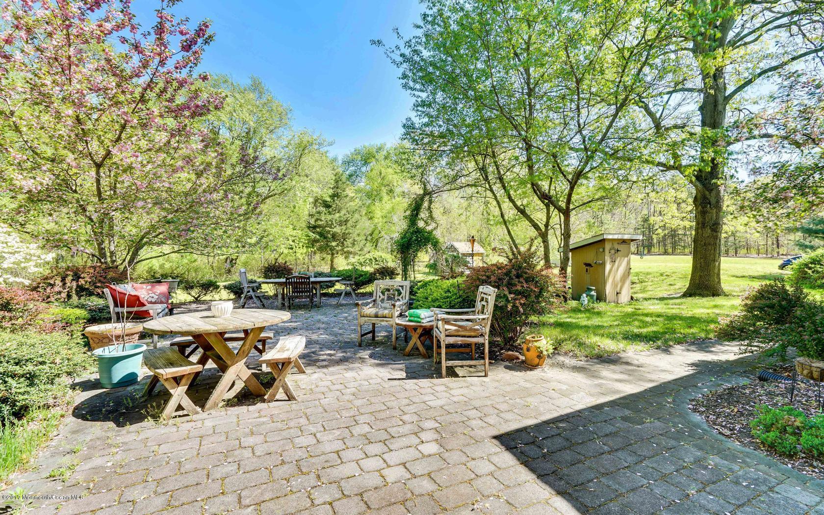 460 North County Line Road Jackson, NJ 08527 - Photo 38 of 48 a view of a backyard with sitting area