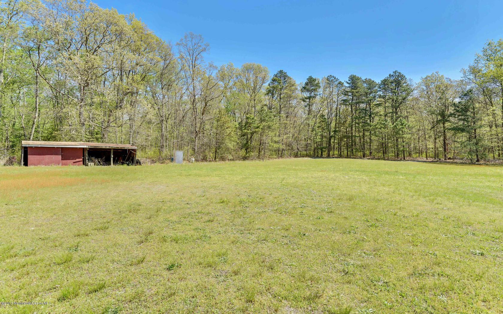460 North County Line Road Jackson, NJ 08527 - Photo 46 of 48 a view of a field with trees in the background