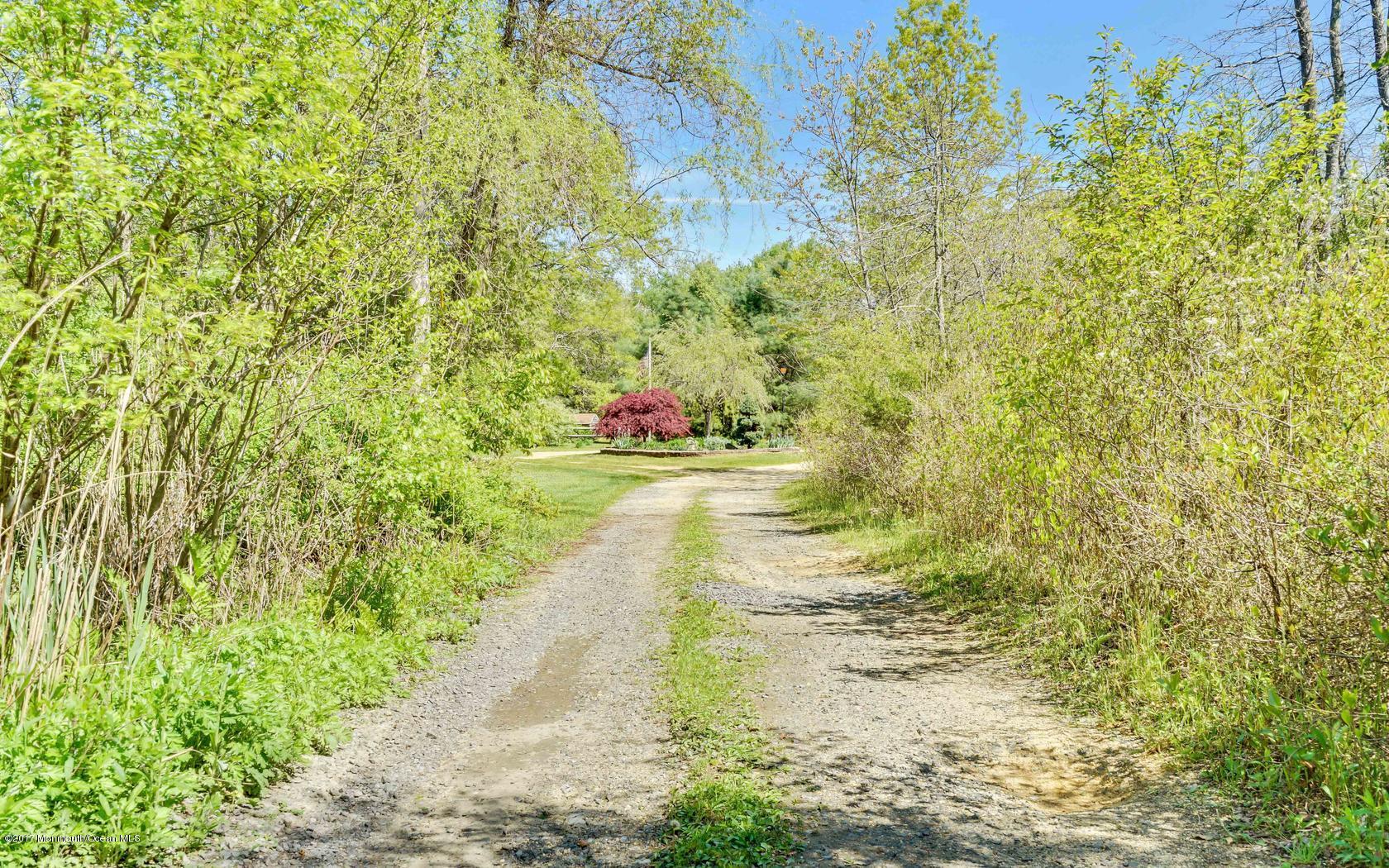 460 North County Line Road Jackson, NJ 08527 - Photo 47 of 48 a view of lake view with a garden