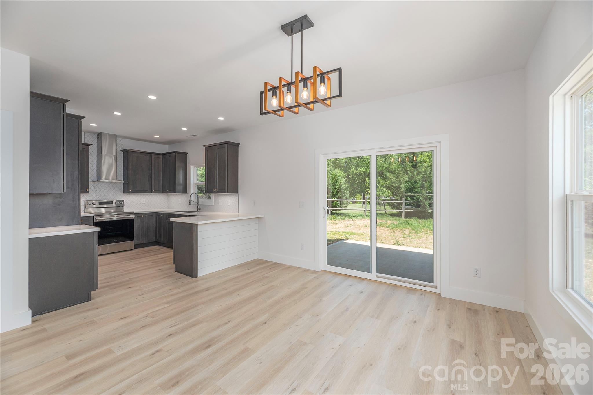 32 Oak Hill Road Candler, NC 28715 - Photo 9 of 29 a view of kitchen with a sink and microwave