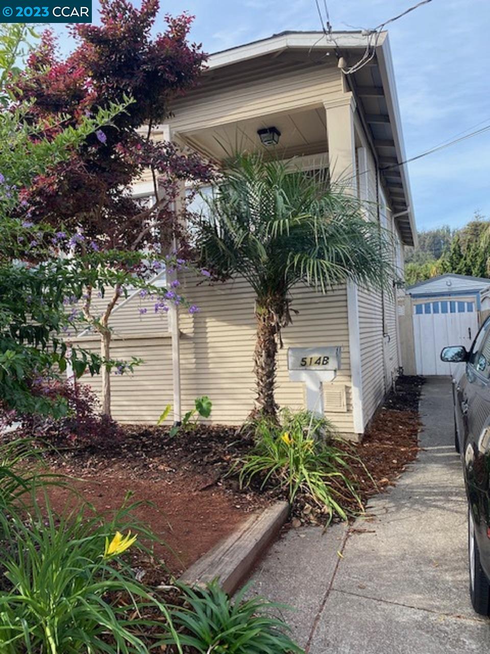 514 Talbot Avenue, Unit 514B Albany, CA 94706 - Photo 10 of 12 a front view of a house with garden