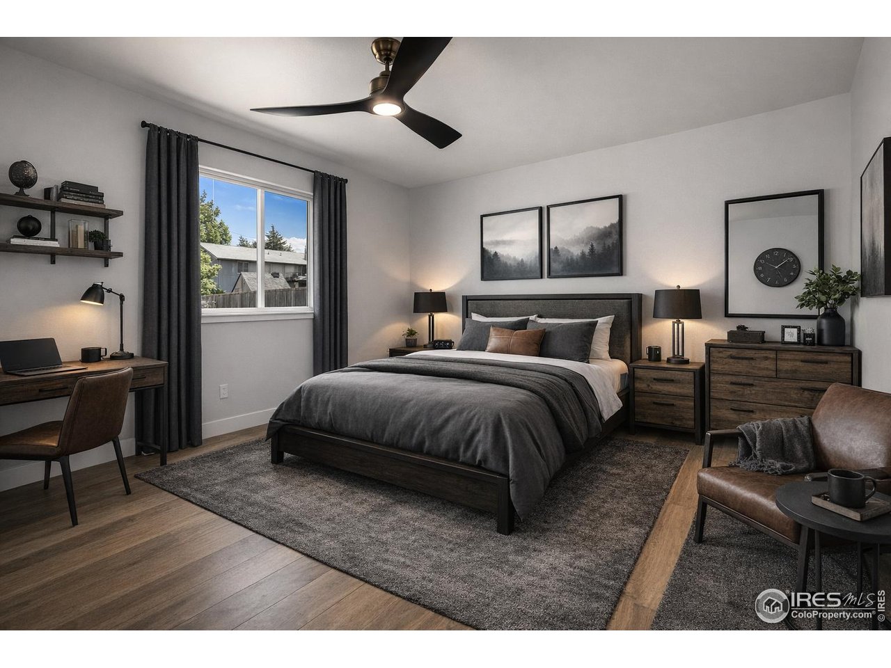 812 Rocky Road Fort Collins, CO 80521 - Photo 12 of 19 a bedroom with a bed and wooden floor