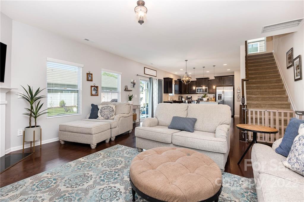 1563 Spring Blossom Trail Fort Mill, SC 29708 - Photo 3 of 25 a living room with furniture and a potted plant