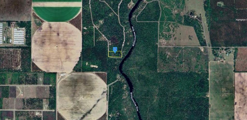 52 Northeast River Ridge Way Lee, FL 32059 - Photo 3 of 6 an aerial view of a house